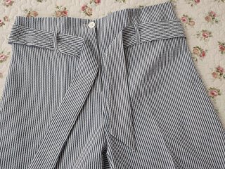 Pantaloni a palazzo righe