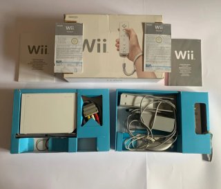 Nintendo Wii + Wii Fit Plus