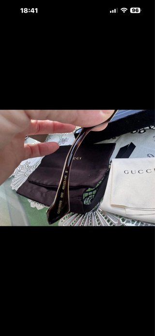 Gafas de sol Gucci negras y marrones