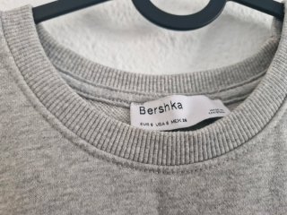 Conjunto deportivo Bershka gris y naranja
