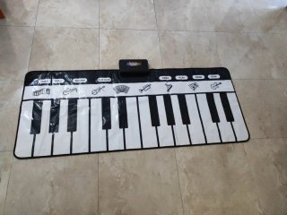 Piano de suelo musical plegable