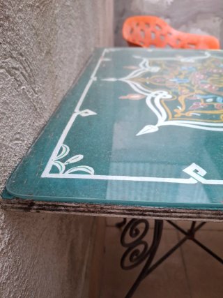 Mesa de jardín decorada hierro y cristal