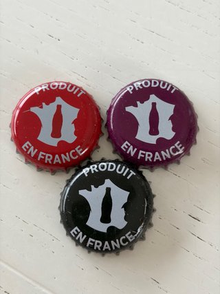 3 lattine Coca Cola prodotte in Francia