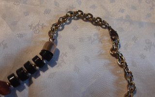 Collana perline nere e marroni