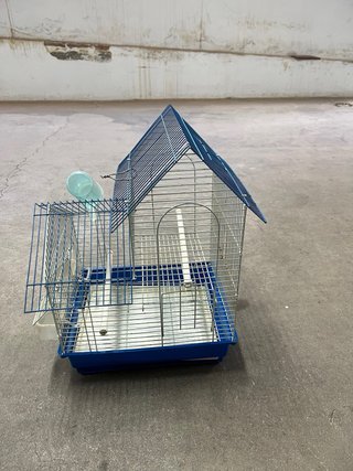 Jaula para pájaros azul y transparente