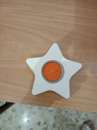 Portacandele a forma di stella in gesso
