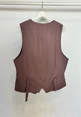 Traje rosa de tres piezas
