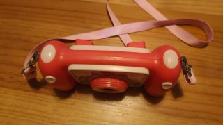 Cámara infantil rosa con correa