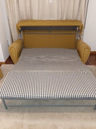 Sofá cama amarillo