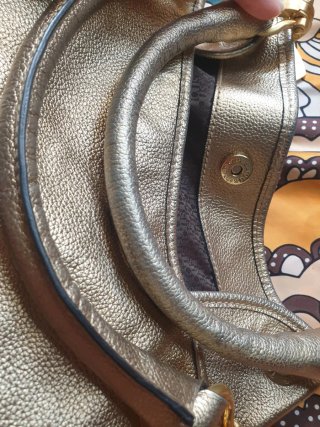 Bolso Piel Tous dorado. Pura piel