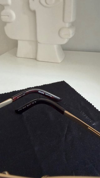Gafas de sol Prada aviador doradas