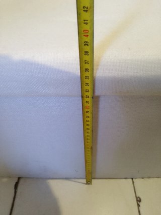 Puf blanco de tela