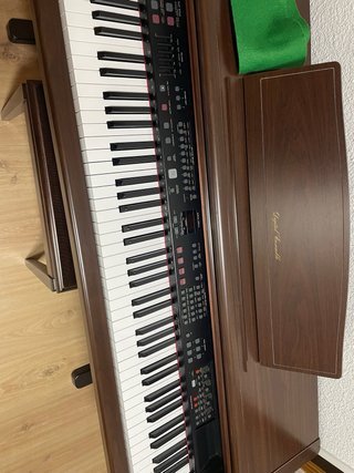 Piano eléctrico Technics mueble con banqueta