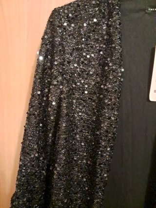 Giacca nera con paillettes