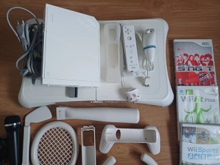 Nintendo Wii + Accesorios y Juegos