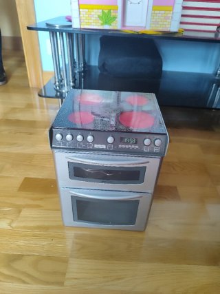 Cocinita de juguete para bebés con sonido.