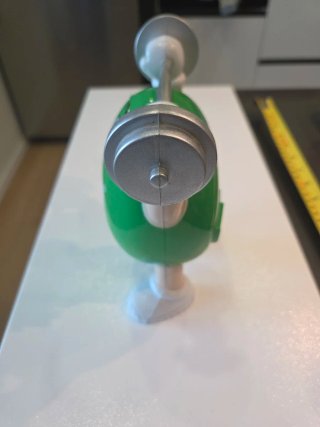 Statuetta M&M Verde con Bilanciere