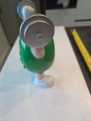 Statuetta M&M Verde con Bilanciere
