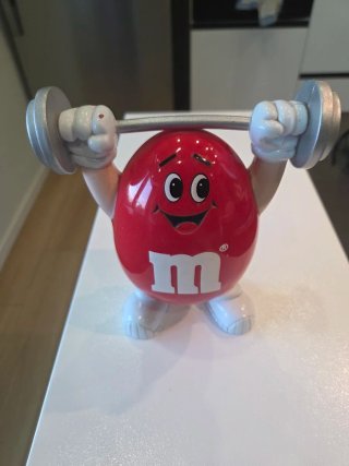 Statuetta M&M Verde con Bilanciere