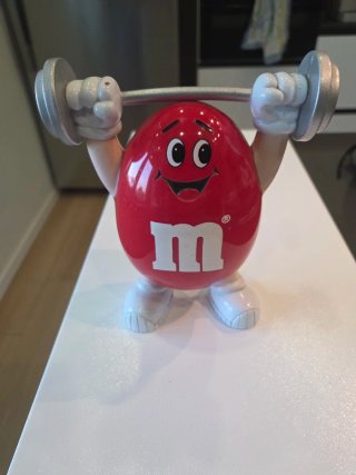 Statuetta M&M Verde con Bilanciere