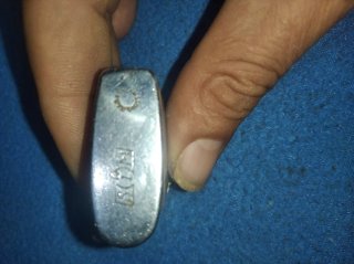 Encendedor antiguo metálico