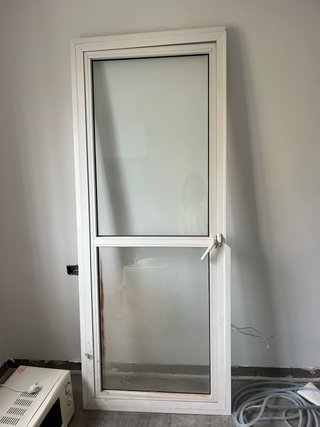 Puerta cristal lavadero