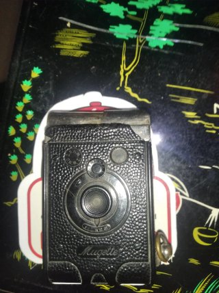 Encendedor de camara de fotos antiguo de gasolina,