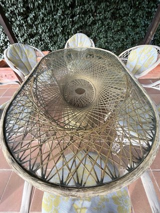 Tavolo da giardino in rattan e 6 sedie in cristallo