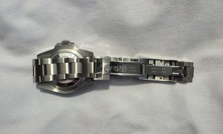 Orologio nuovo verde e argento