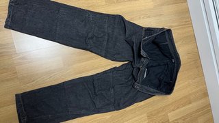Vaqueros Moto Negro son algo elástico.