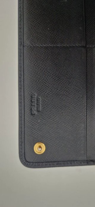 Pochette Prada nera con catena
