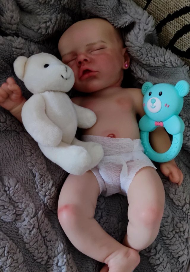 Bebé reborn silicona niña 33-34cm