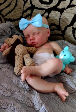 Bebé reborn silicona niña 33-34cm