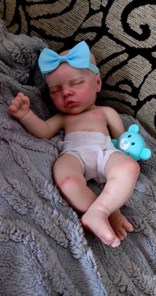 Bebé reborn silicona niña 33-34cm