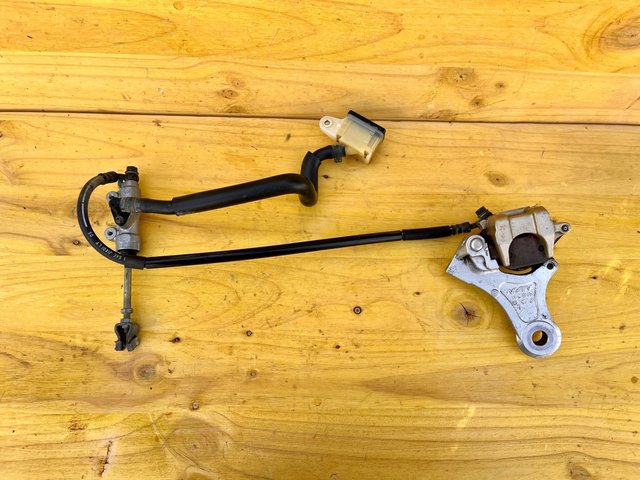 Pinza y bomba freno trasero Nissin Honda Transalp