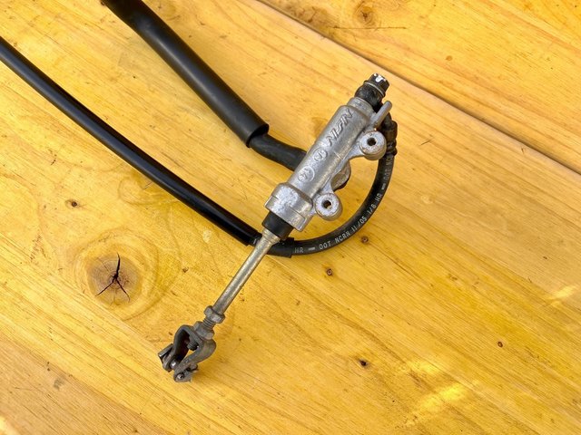 Pinza y bomba freno trasero Nissin Honda Transalp