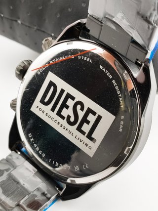 Reloj Diesel Spiked nuevo, negro y dorado
