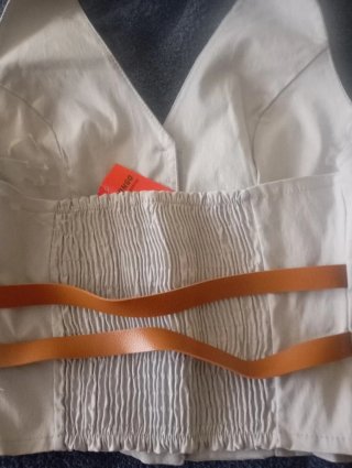 Chaleco nuevo  gris perla con hebillas