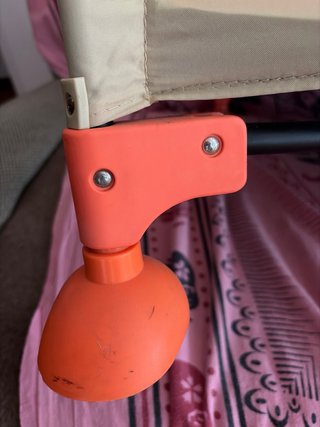Cuna de viaje naranja