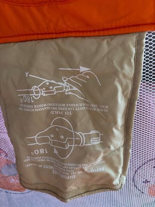 Cuna de viaje naranja