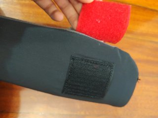 Espinilleras Outshock Negras con Rojo