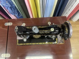 Máquina de coser Sigma antigua