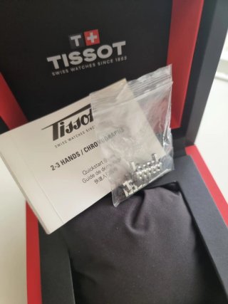 Scatola Tissot con maglie e libretto