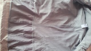Chaqueta chubasquero gris y rosa