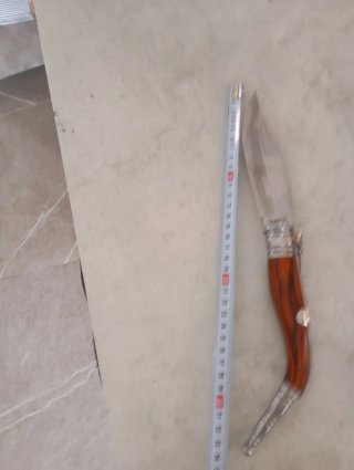 Navaja multiusos de madera y metal