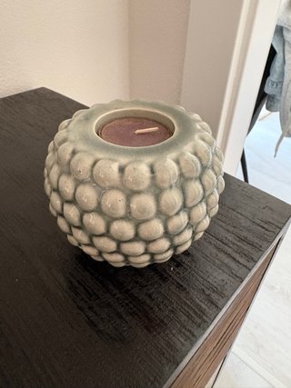 Portacandele in ceramica con candela