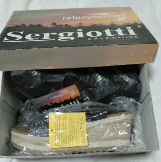 Sandalias Sergiotti negras y plateadas