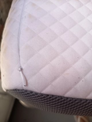 Almohada Homca cervical gris y blanca