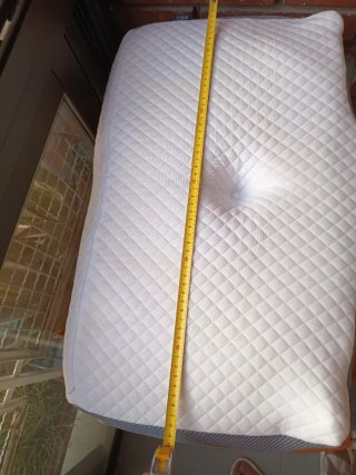 Almohada Homca cervical gris y blanca