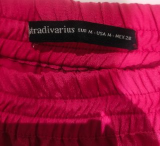 Pantalón corto rosa con cremalleras